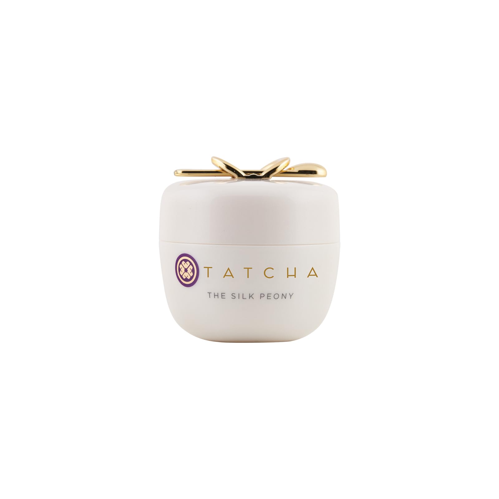 Tatcha skincare product with gold accents on a white background