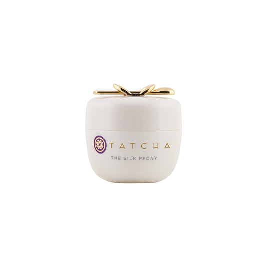 Tatcha skincare product with gold accents on a white background