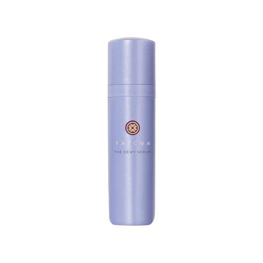 Purple serum bottle with Tatcha logo on a white background