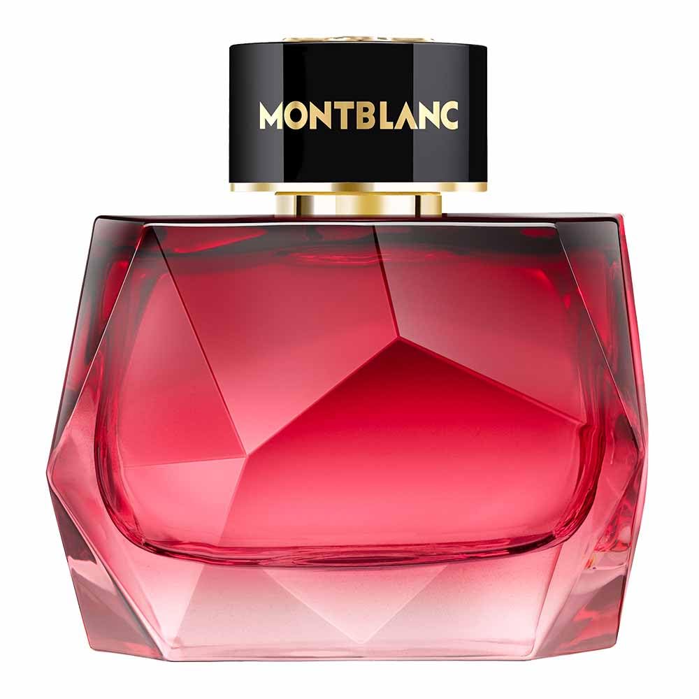 Montblanc perfume bottle with red glass and black cap on a white background