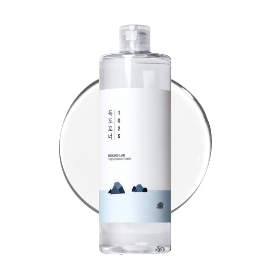 Clear bottle with a white label featuring text and blue elements on a white background