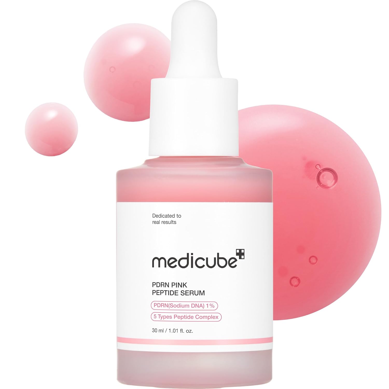 Medicube PDN Pink Peptide Serum bottle with pink bubbles on a white background