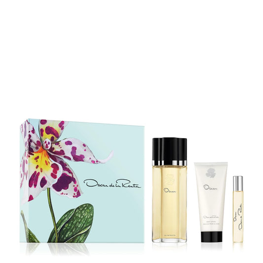 Oscar de la Renta perfume set with a box featuring an orchid design on a white background.