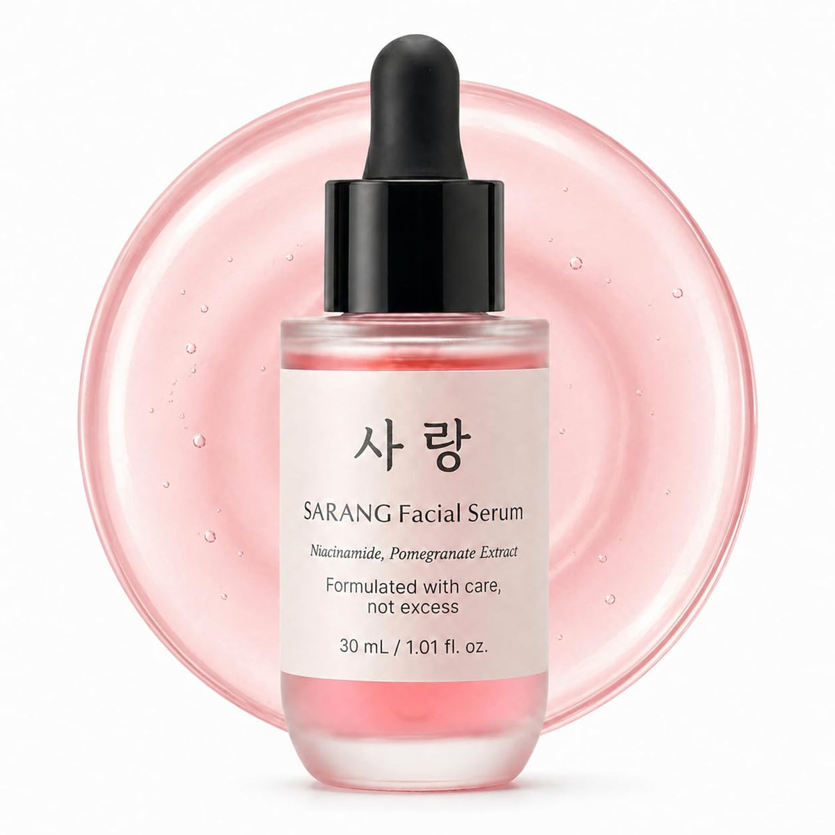 SARANG Facial Serum bottle with dropper on a pink circular background