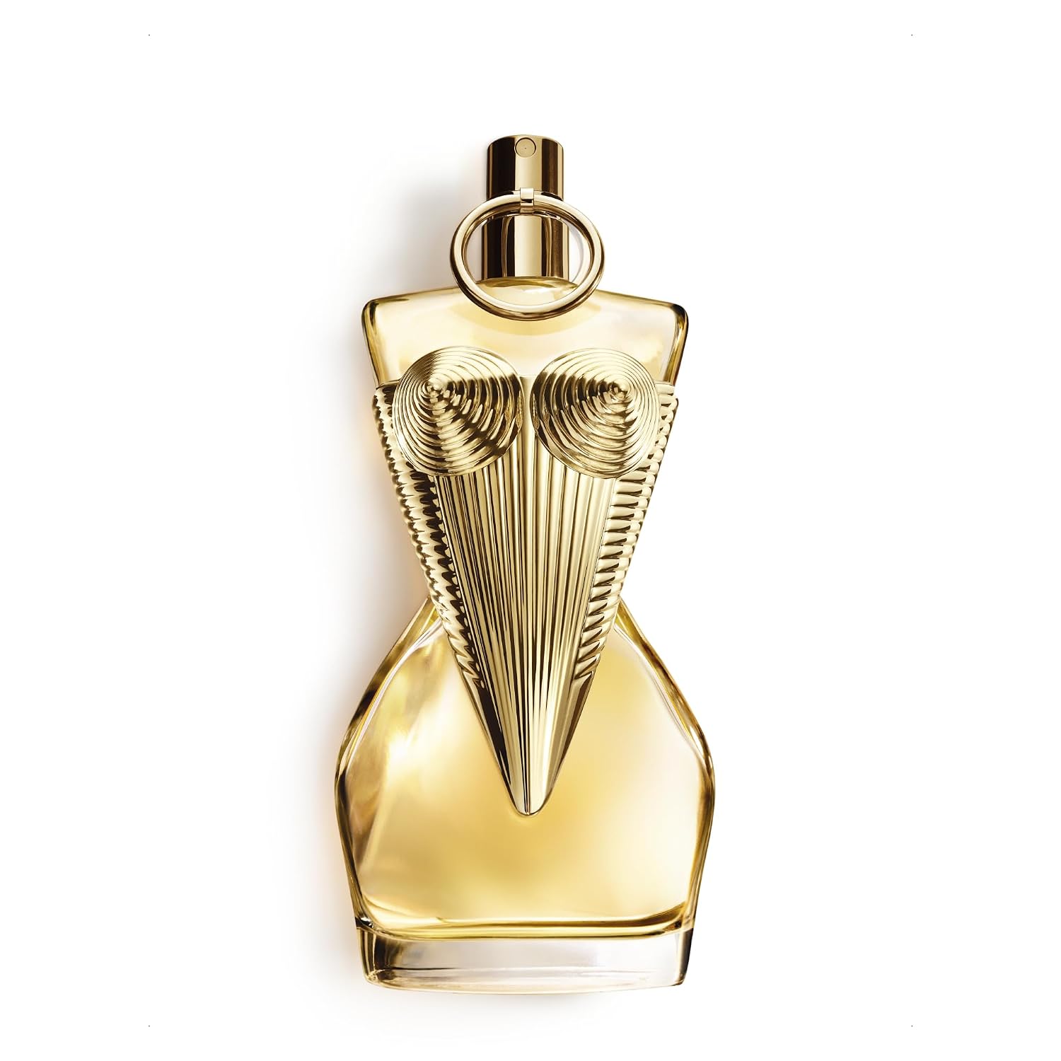 A gold-toned perfume bottle with a sculptural, dress-like form and ribbed metallic details, photographed on a clean white background.