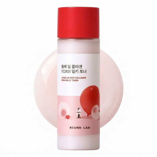 Skincare bottle with red cap and pink body on a white background