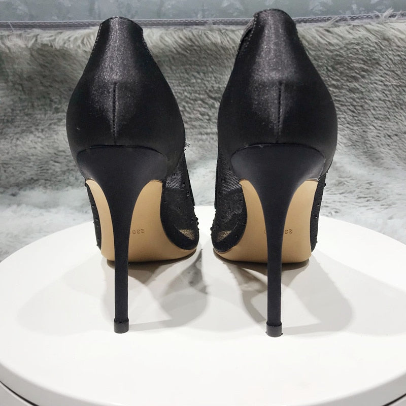 Purple and black high heel shoes with gold motifs on Craiyon